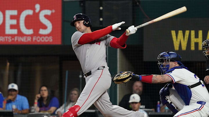 Mar 29, 2025; Arlington, Texas, USA; Boston Red Sox third baseman Alex Bregman (2) singles during the first inning against the Texas Ranges at Globe Life Field. Mandatory Credit: Raymond Carlin III-Imagn Images