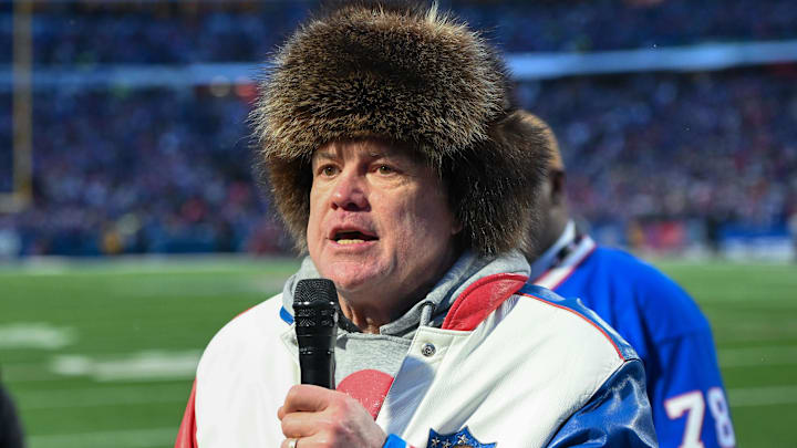 Former Buffalo player Steve Tasker leads a pre-game cheer with the crowd before a game against the New York Jets at Highmark Stadium. Former Buffalo player Steve Tasker leads a pre-game cheer with the crowd before a game against the New York Jets at Highmark Stadium.