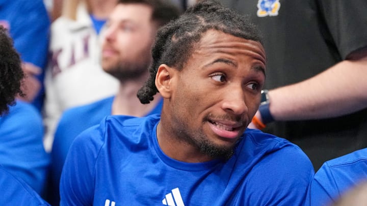 Dec 2, 2025; Lawrence, Kansas, USA; Kansas Jayhawks guard Darryn Peterson (22) on the bench out from an injury against the UConn Huskies. Dec 2, 2025; Lawrence, Kansas, USA; Kansas Jayhawks guard Darryn Peterson (22) on the bench out from an injury against the UConn Huskies.