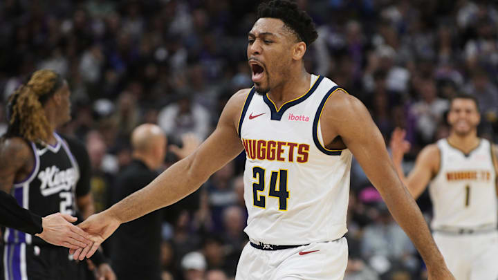 Apr 9, 2025; Sacramento, California, USA; Denver Nuggets guard Jalen Pickett (24) celebrates after making a three point shot against the Sacramento Kings during the third quarter at Golden 1 Center. Mandatory Credit: Ed Szczepanski-Imagn Images