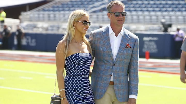 Mississippi Rebels head coach Lane Kiffin poses for a photo with his daughter Landry Kiffin prior to the game against the LSU Tigers at Vaught-Hemingway Stadium.