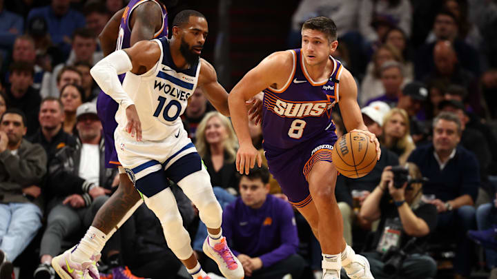 Jan 29, 2025; Phoenix, Arizona, USA; Phoenix Suns guard Grayson Allen (8) dribbles the ball past Minnesota Timberwolves guard Mike Conley (10) in the first half at Footprint Center. Mandatory Credit: Mark J. Rebilas-Imagn Images Jan 29, 2025; Phoenix, Arizona, USA; Phoenix Suns guard Grayson Allen (8) dribbles the ball past Minnesota Timberwolves guard Mike Conley (10) in the first half at Footprint Center. Mandatory Credit: Mark J. Rebilas-Imagn Images