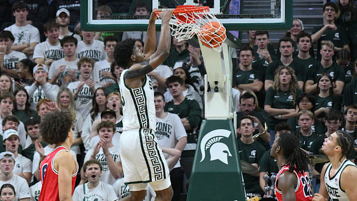 Nov 21, 2025; East Lansing, Michigan, USA;  Michigan State Spartans forward Cameron Ward (3) dunks the ball against the Detroit Mercy Titans during the first half at Jack Breslin Student Events Center. Mandatory Credit: Dale Young-Imagn Images