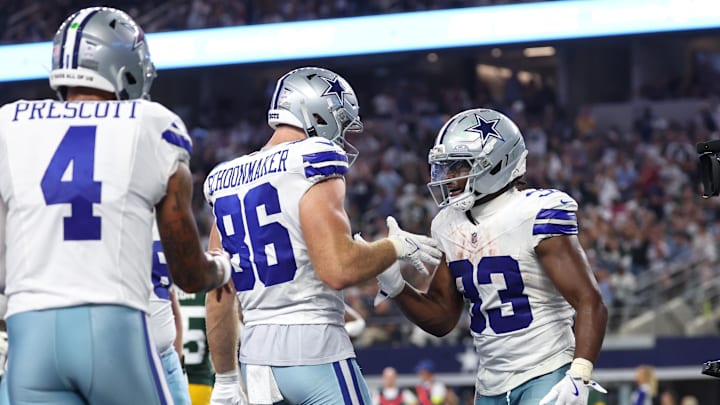 Dallas Cowboys running back Javonte Williams celebrates with tight end Luke Schoonmaker after scoring a touchdown