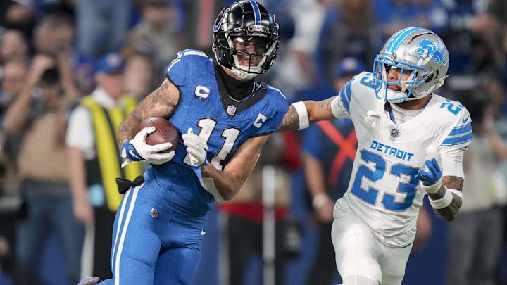 Nov 24, 2024; Indianapolis, Indiana, USA; Detroit Lions cornerback Carlton Davis III (23) chases after Indianapolis Colts wide receiver Michael Pittman Jr. (11) during a game against the Detroit Lions  at Lucas Oil Stadium. Mandatory Credit: Christine Tannous/USA TODAY Network via Imagn Images