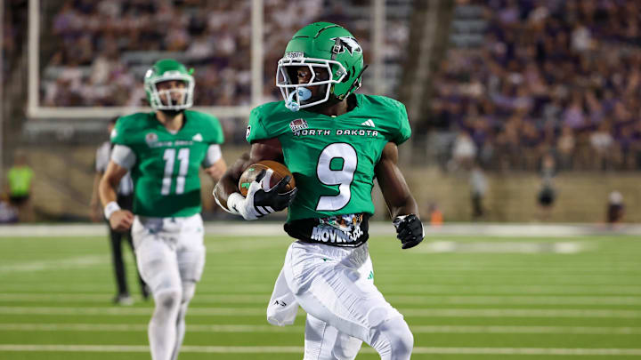 Aug 30, 2025; Manhattan, Kansas, USA; North Dakota Fighting Hawks running back Sawyer Seidl (9) scores a touchdown in the fourth quarter against the Kansas State Wildcats at Bill Snyder Family Football Stadium. Mandatory Credit: Scott Sewell-Imagn Images Aug 30, 2025; Manhattan, Kansas, USA; North Dakota Fighting Hawks running back Sawyer Seidl (9) scores a touchdown in the fourth quarter against the Kansas State Wildcats at Bill Snyder Family Football Stadium. Mandatory Credit: Scott Sewell-Imagn Images