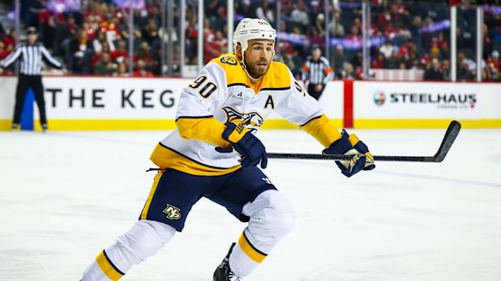 Jan 4, 2025; Calgary, Alberta, CAN; Nashville Predators center Ryan O'Reilly (90) skates against the Calgary Flames during the third period at Scotiabank Saddledome. Mandatory Credit: Sergei Belski-Imagn Images