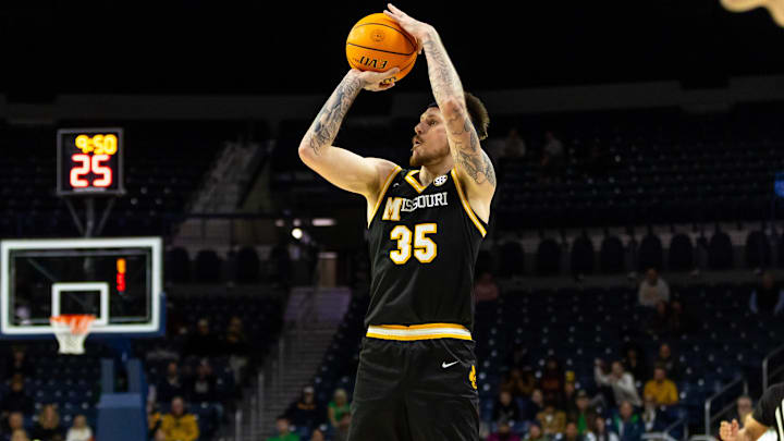 Dec 2, 2025; South Bend, Indiana, USA; Missouri Tigers guard Jacob Crews (35) shoots against the Notre Dame Fighting Irish during the second half at Purcell Pavilion at the Joyce Center. Mandatory Credit: Michael Caterina-Imagn Images Dec 2, 2025; South Bend, Indiana, USA; Missouri Tigers guard Jacob Crews (35) shoots against the Notre Dame Fighting Irish during the second half at Purcell Pavilion at the Joyce Center. Mandatory Credit: Michael Caterina-Imagn Images