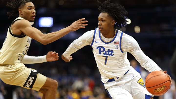 Pittsburgh Panthers guard Carlton Carrington (7) drives to the basket as Wake Forest Demon Deacons guard Hunter Sallis (23) defends at Capital One Arena, last March. Carrington is projected to be selected in the first round of Wednesday's NBA Draft and some believe he could be a lottery pick.