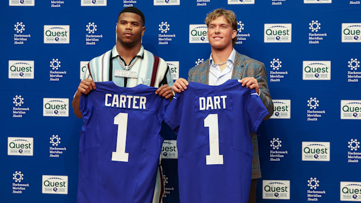 Apr 25, 2025; East Rutherford, NJ, US; New York Giants first-round draft picks, Abdul Carter and Jaxson Dart, pose for photos before the start of the press conference.  