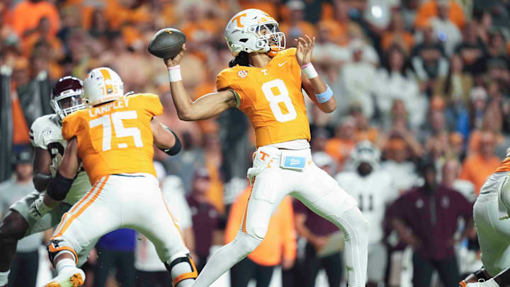 Nov 9, 2024; Knoxville, Tennessee Volunteers, USA; Tennessee Volunteers quarterback Nico Iamaleava (8) throws to  wide receiver Dont'e Thornton Jr. (not pictured) for a touchdown against the Mississippi State Bulldogs during the first half at Neyland Stadium. Mandatory Credit: Caitie McMekin/USA TODAY Network via Imagn Images