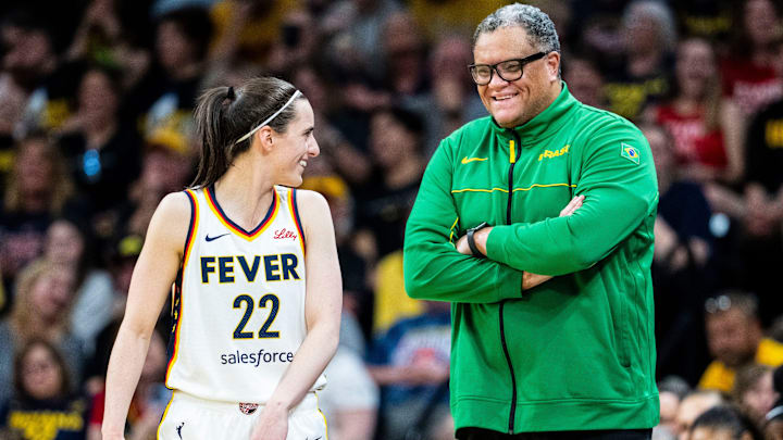 Indiana Fever guard Caitlin Clark (22) smiles with Brazilian National Team head coach Leonardo Figueroa on Sunday, May 4, 2025, during a preseason game between the Indiana Fever and the Brazil national team at Carver-Hawkeye Arena in Iowa City. The Indiana Fever defeated the Brazilian National Team, 108-44. Indiana Fever guard Caitlin Clark (22) smiles with Brazilian National Team head coach Leonardo Figueroa on Sunday, May 4, 2025, during a preseason game between the Indiana Fever and the Brazil national team at Carver-Hawkeye Arena in Iowa City. The Indiana Fever defeated the Brazilian National Team, 108-44.