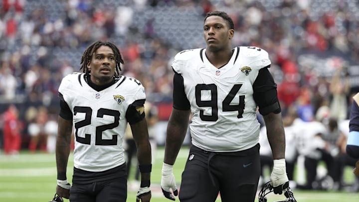 Sep 29, 2024; Houston, Texas, USA; Jacksonville Jaguars cornerback Jarrian Jones (22) and defensive tackle Maason Smith (94) after the game against the Houston Texans at NRG Stadium. Mandatory Credit: Troy Taormina-Imagn Images Sep 29, 2024; Houston, Texas, USA; Jacksonville Jaguars cornerback Jarrian Jones (22) and defensive tackle Maason Smith (94) after the game against the Houston Texans at NRG Stadium. Mandatory Credit: Troy Taormina-Imagn Images