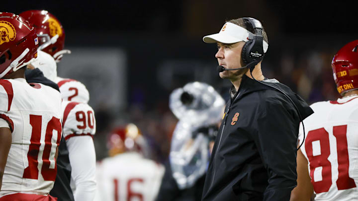Nov 2, 2024; Seattle, Washington, USA; USC Trojans head coach Lincoln Riley stands on the sideline during the fourth quarter against the Washington Huskies at Alaska Airlines Field at Husky Stadium. Mandatory Credit: Joe Nicholson-Imagn Images