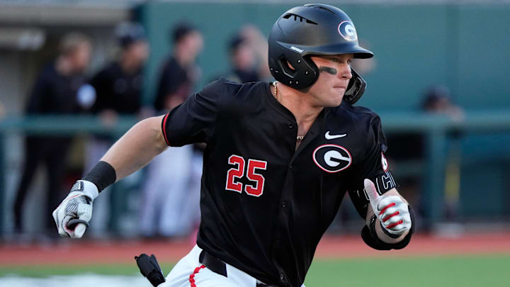 Georgia catcher Daniel Jackson (25) runs for first during a NCAA baseball game against Arkansas in Athens, Ga., on Friday, April 11, 2025.