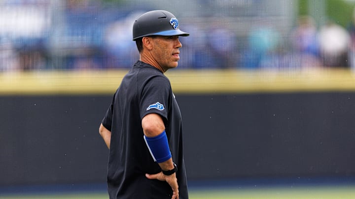 Jun 1, 2024; Lexington, KY, USA; Kentucky Wildcats head coach Nick Mingione stands on the field before a game against the Illinois Fighting Illini at Kentucky Proud Park. Mandatory Credit: Jordan Prather-USA TODAY Sports