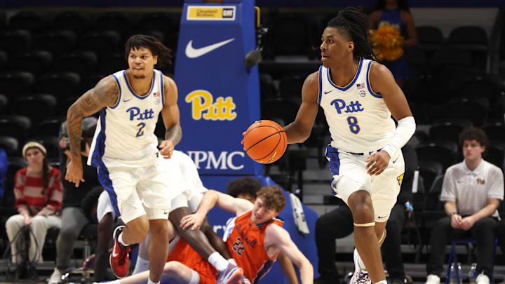 Nov 17, 2025; Pittsburgh, Pennsylvania, USA;  Pittsburgh Panthers guard Omari Witherspoon (8) brings the ball up court on a fast break against the Bucknell Bison during the first half at the Petersen Events Center. Mandatory Credit: Charles LeClaire-Imagn Images