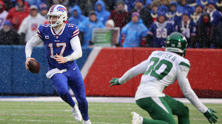 Bills quarterback Josh Allen cuts back for extra yards against the Jets.