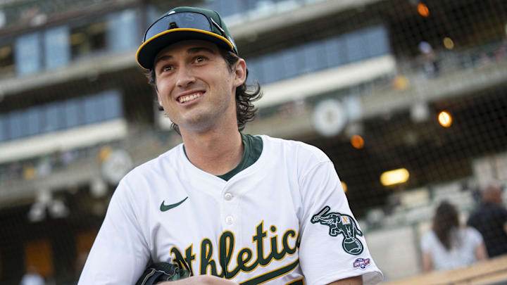 Jul 19, 2024; Oakland, California, USA; Oakland Athletics shortstop Jacob Wilson (5) walks towards the field before the start of the game against the Los Angeles Angels at Oakland-Alameda County Coliseum. Mandatory Credit: Cary Edmondson-Imagn Images