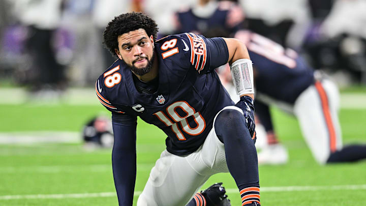 Dec 16, 2024; Minneapolis, Minnesota, USA; Chicago Bears quarterback Caleb Williams (18) looks on before the game against the Minnesota Vikings at U.S. Bank Stadium. Mandatory Credit: Jeffrey Becker-Imagn Images