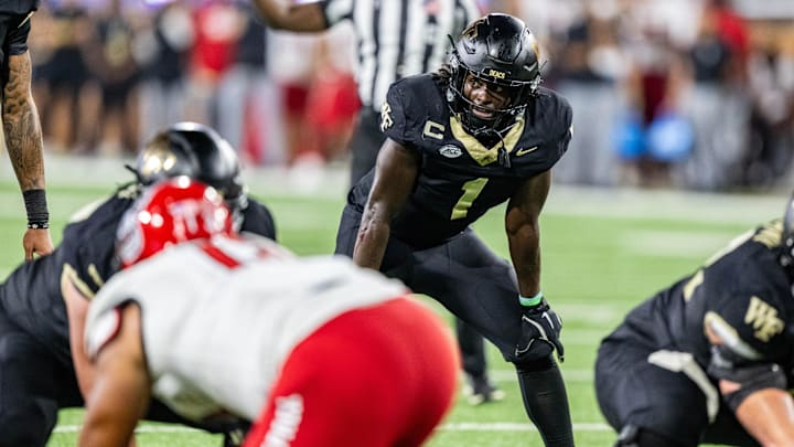 Sep 11, 2025; Winston-Salem, North Carolina, USA;  Wake Forest Demon Deacons running back Demond Claiborne (1) awaits the snap in the first half against the North Carolina State Wolfpack at Allegacy Federal Credit Union Stadium. Mandatory Credit: Luke Jamroz-Imagn Images