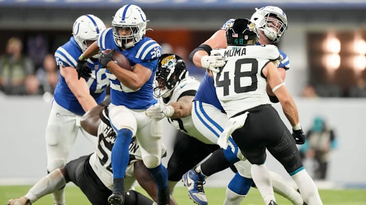 Indianapolis Colts running back Jonathan Taylor (28) rushes the ball Sunday, Jan. 5, 2025, during a game against the Jacksonville Jaguars at Lucas Oil Stadium in Indianapolis.