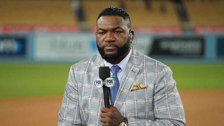 Oct 26, 2024; Los Angeles, California, USA; Fox Sports broadcaster David Ortiz speaks on field after game two between the Los Angeles Dodgers and the New York Yankees in the 2024 MLB World Series at Dodger Stadium. Mandatory Credit: Kirby Lee-Imagn Images