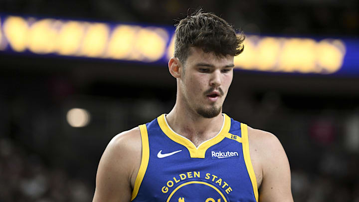 Oct 15, 2024; Las Vegas, Nevada, USA; Golden State Warriors center Quinten Post (21) looks on against the Los Angeles Lakers in the fourth quarter during a preseason game at T-Mobile Arena. Mandatory Credit: Candice Ward-Imagn Images Oct 15, 2024; Las Vegas, Nevada, USA; Golden State Warriors center Quinten Post (21) looks on against the Los Angeles Lakers in the fourth quarter during a preseason game at T-Mobile Arena. Mandatory Credit: Candice Ward-Imagn Images