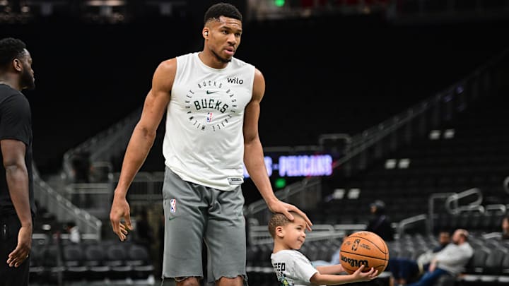 Apr 10, 2025; Milwaukee, Wisconsin, USA: Milwaukee Bucks forward Giannis Antetokounmpo (34) warms up with his son, Maverick, age 4, before game against the New Orleans Pelicans at Fiserv Forum. Mandatory Credit: Benny Sieu-Imagn Images Apr 10, 2025; Milwaukee, Wisconsin, USA: Milwaukee Bucks forward Giannis Antetokounmpo (34) warms up with his son, Maverick, age 4, before game against the New Orleans Pelicans at Fiserv Forum. Mandatory Credit: Benny Sieu-Imagn Images