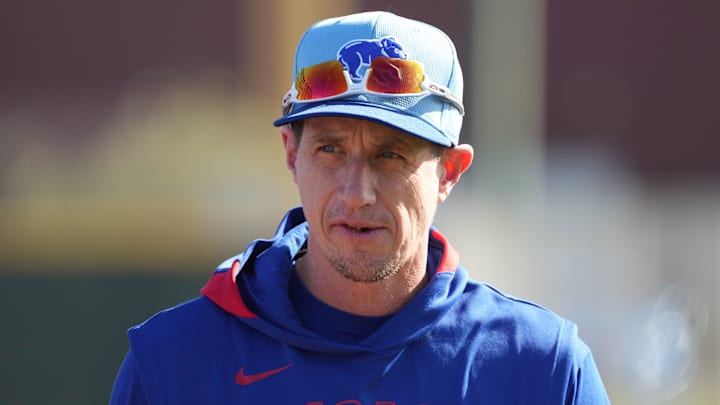 Feb 10, 2025; Mesa, AZ, USA; Chicago Cubs manager Craig Counsell (11) watches players warm up during spring training camp. Mandatory Credit: Rick Scuteri-Imagn Images