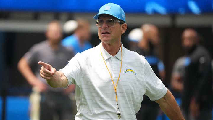 Aug 10, 2025; Inglewood, California, USA; Los Angeles Chargers coach Jim Harbaugh reacts during the game against the New Orleans Saints at SoFi Stadium. Mandatory Credit: Kirby Lee-Imagn Images