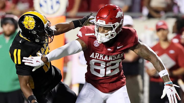 Aug 29, 2024; Little Rock, Arkansas, USA; Arkansas Razorbacks wide receiver Monte Harrison (82) blocks on a play in the fourth quarter against the Pine Bluff Golden Lions at War Memorial Stadium. Arkansas won 70-0. Mandatory Credit: Nelson Chenault-Imagn Images