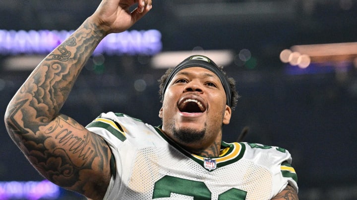 Preston Smith runs off the field after the Green Bay Packers beat the Minnesota Vikings at U.S. Bank Stadium. 