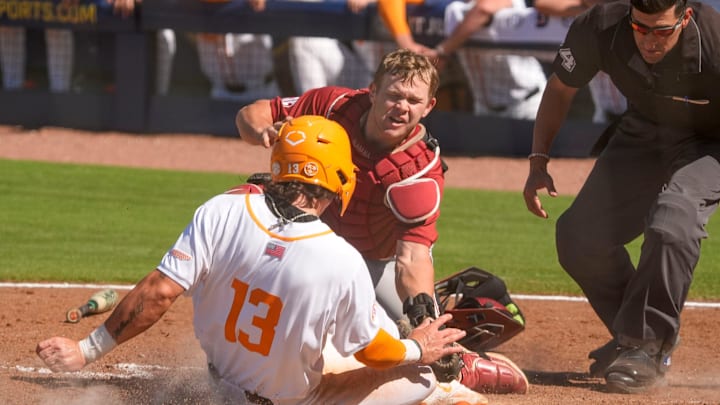 May 21, 2025; Hoover, AL, USA; Alabama catcher Brady Neal (10) tags out Tennessee base runner Reese Chapman as he tries to score during a five-run Tennessee sixth inning in the second round of the SEC Baseball Tournament at the Hoover Met. May 21, 2025; Hoover, AL, USA; Alabama catcher Brady Neal (10) tags out Tennessee base runner Reese Chapman as he tries to score during a five-run Tennessee sixth inning in the second round of the SEC Baseball Tournament at the Hoover Met.
