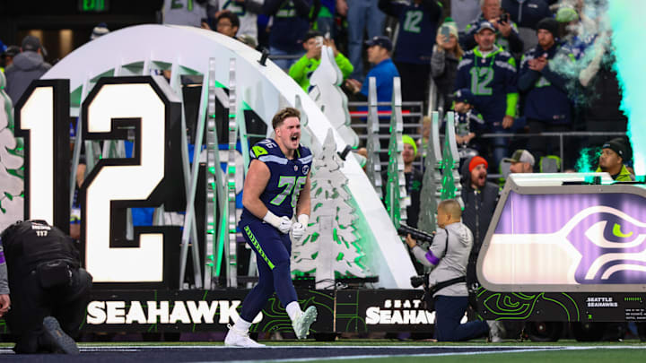 Jan 17, 2026; Seattle, WA, USA; Seattle Seahawks guard Grey Zabel (76) takes the field prior to a game against the San Francisco 49ers in an NFC Divisional Round game at Lumen Field. Mandatory Credit: Kevin Ng-Imagn Images