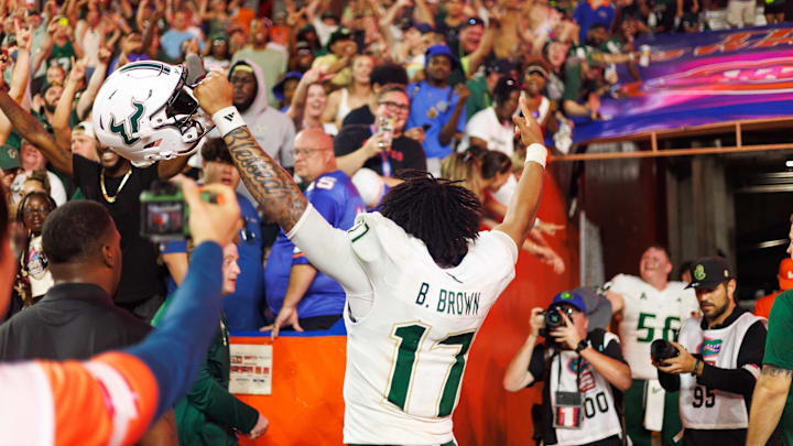 Sep 6, 2025; Gainesville, Florida, USA; South Florida Bulls quarterback Byrum Brown (17) gestures towards fans after a game against the Florida Gators at Ben Hill Griffin Stadium. Mandatory Credit: Matt Pendleton-Imagn Images