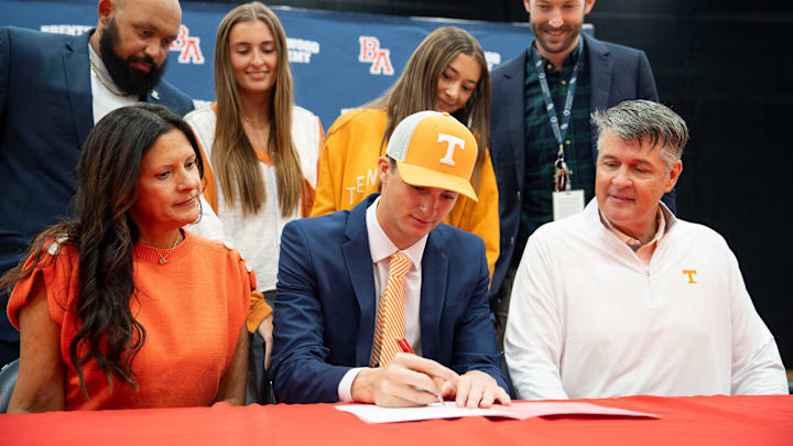 George MacIntyre sits with his family during signing day at Brentwood High School in Brentwood, Tenn., Wednesday, Dec. 4, 2024.