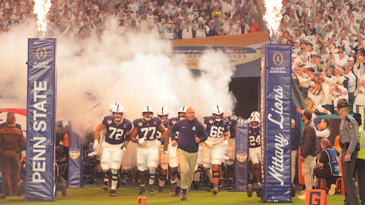 Penn State football coach James Franklin leads the Nittany Lions onto the field for the Orange Bowl vs. the Notre Dame Fighting Irish.