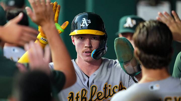 Aug 18, 2026; Kansas City, Missouri, USA; Athletics center fielder Henry Bolte (33) is congratulated by teammates after scoring during the sixth inning against the Athletics at Kauffman Stadium. Mandatory Credit: Jay Biggerstaff-Imagn Images Aug 18, 2026; Kansas City, Missouri, USA; Athletics center fielder Henry Bolte (33) is congratulated by teammates after scoring during the sixth inning against the Athletics at Kauffman Stadium. Mandatory Credit: Jay Biggerstaff-Imagn Images