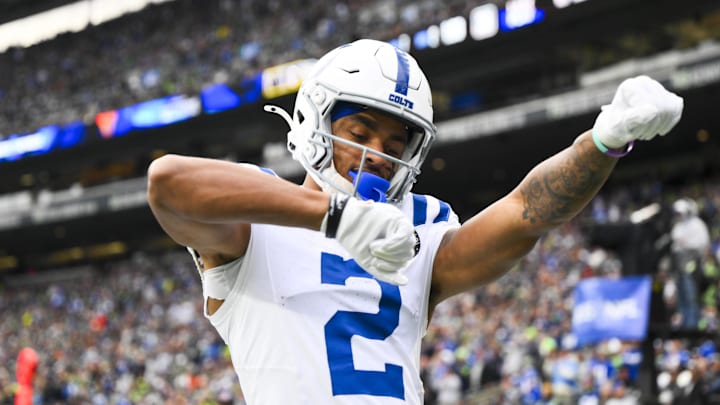 Dec 14, 2025; Seattle, Washington, USA; Indianapolis Colts wide receiver Josh Downs (2) celebrates after catching a touchdown pass against the Seattle Seahawks during the second quarter at Lumen Field. Mandatory Credit: Steven Bisig-Imagn Images