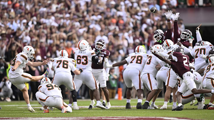Dec 20, 2025; College Station, TX, USA; Miami Hurricanes kicker Carter Davis (38) misses a filed goal against the Texas A&M Aggies during first half of the first round game of the CFP National Playoff at Kyle Field. Mandatory Credit: Jerome Miron-Imagn Images