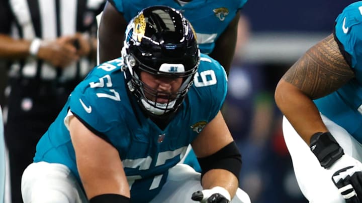 Aug 12, 2023; Arlington, Texas, USA;  Jacksonville Jaguars offensive tackle Chandler Brewer (67), guard Samuel Jackson (62) and offensive tackle Cam Robinson (74) on the line of scrimmage against the Dallas Cowboys at AT&T Stadium. Mandatory Credit: Tim Heitman-Imagn Images