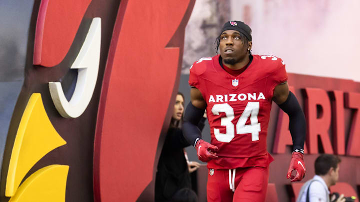 Dec 7, 2025; Glendale, Arizona, USA; Arizona Cardinals safety Jalen Thompson (34) against the Los Angeles Rams at State Farm Stadium. Mandatory Credit: Mark J. Rebilas-Imagn Images