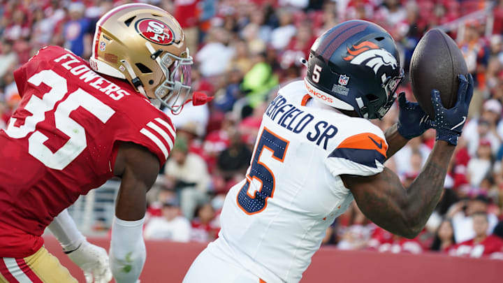 Aug 9, 2025; Santa Clara, California, USA;  Denver Broncos wide receiver Trent Sherfield Sr. (5) makes a touchdown catch over San Francisco 49ers cornerback Dallis Flowers (35) in the second quarter at Levi's Stadium. 