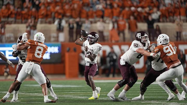 Texas A&M Aggies quarterback Marcel Reed (10) throws a pass during the first half against the Texas Longhorns at Darrell K Royal-Texas Memorial Stadium. Texas A&M Aggies quarterback Marcel Reed (10) throws a pass during the first half against the Texas Longhorns at Darrell K Royal-Texas Memorial Stadium.