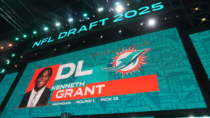 Michigan Wolverines defensive lineman Kenneth Grant is selected as the No. 13 pick by the Miami Dolphins during the 2025 NFL Draft at Lambeau Field.