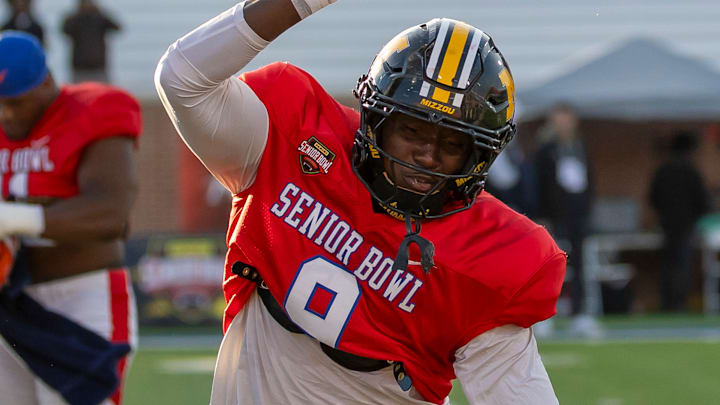 American defensive end Zion Young (9) of Missouri works in a drill during American Senior Bowl practice at Hancock Whitney Stadium.