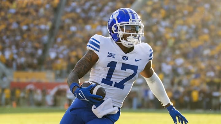 Nov 23, 2024; Tempe, Arizona, USA; Brigham Young Cougars wide receiver Keelan Marion (17) scores a touchdown against the Arizona State Sun Devils at Mountain America Stadium. Mandatory Credit: Mark J. Rebilas-Imagn Images