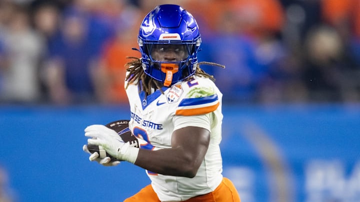 Dec 31, 2024; Glendale, AZ, USA; Boise State Broncos running back Ashton Jeanty (2) against the Penn State Nittany Lions during the Fiesta Bowl at State Farm Stadium. Mandatory Credit: Mark J. Rebilas-Imagn Images