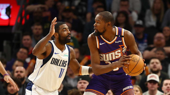 Dec 27, 2024; Phoenix, Arizona, USA; Phoenix Suns forward Kevin Durant (35) against Dallas Mavericks guard Kyrie Irving (11) at Footprint Center. Mandatory Credit: Mark J. Rebilas-Imagn Images Dec 27, 2024; Phoenix, Arizona, USA; Phoenix Suns forward Kevin Durant (35) against Dallas Mavericks guard Kyrie Irving (11) at Footprint Center. Mandatory Credit: Mark J. Rebilas-Imagn Images